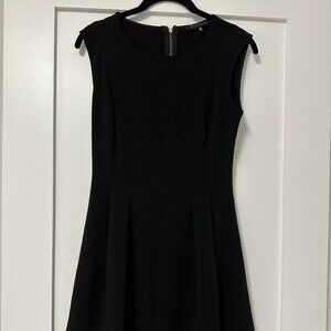 Dynamite- Fit and flare black dress with back zipper and cap sleeves
